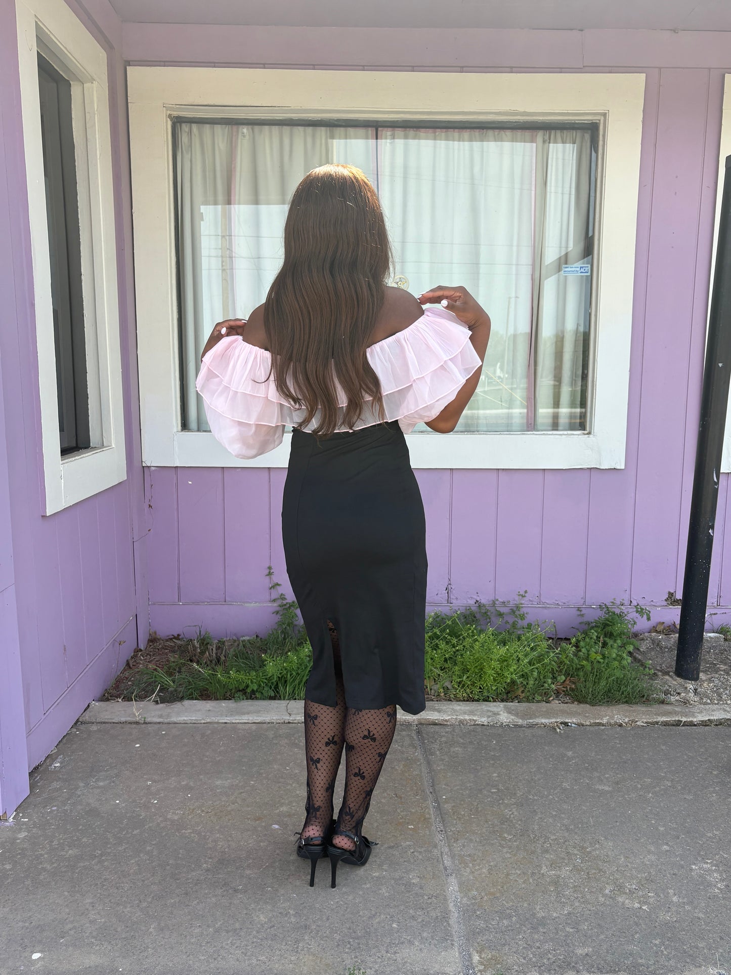 Dark Feminine Spring – Black Bodycon Dress with Pink Ruffle Detail